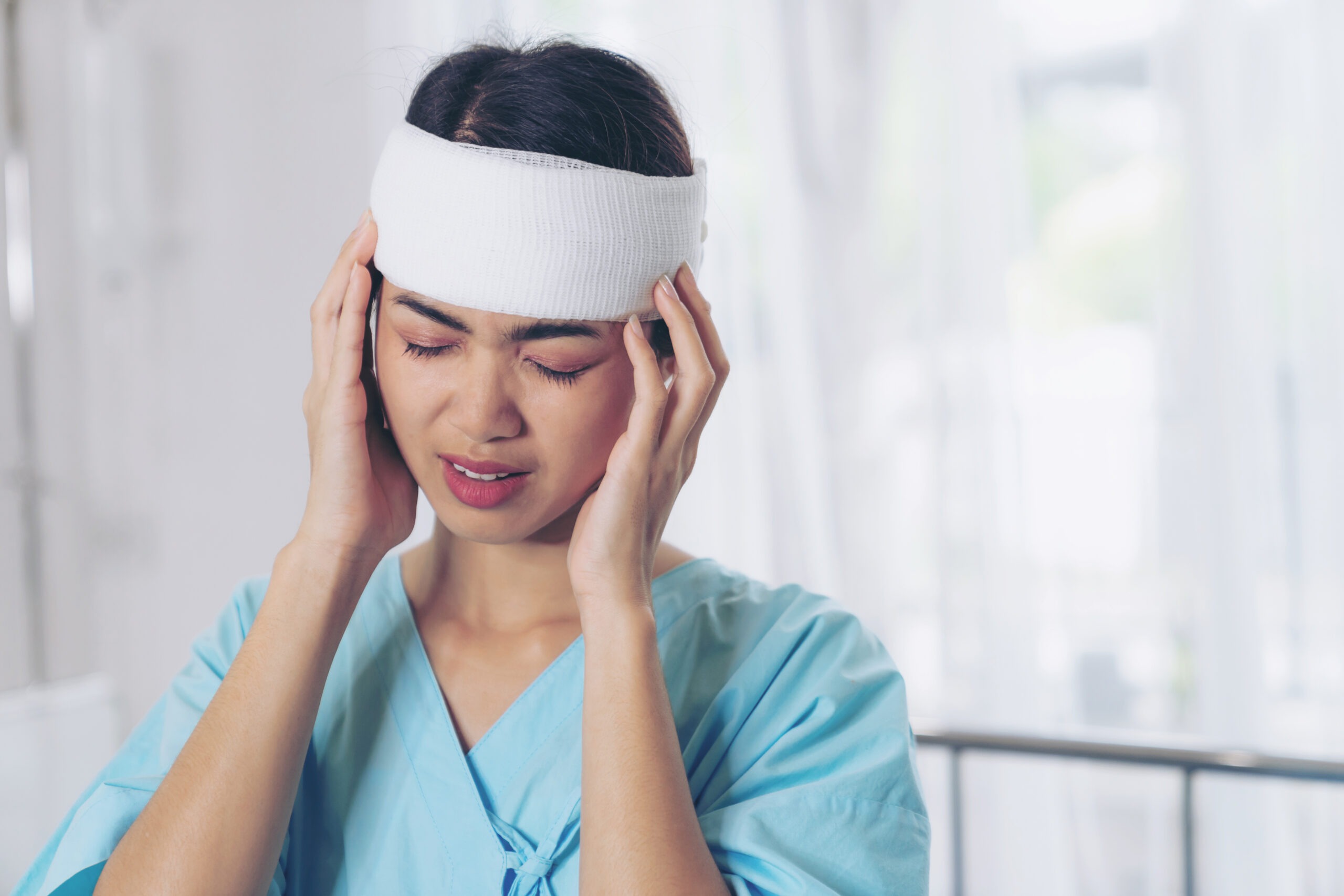 Lonely accident patients injury headache woman in hospital – medical concept Lonely accident patients injury headache woman in hospital - medical concept